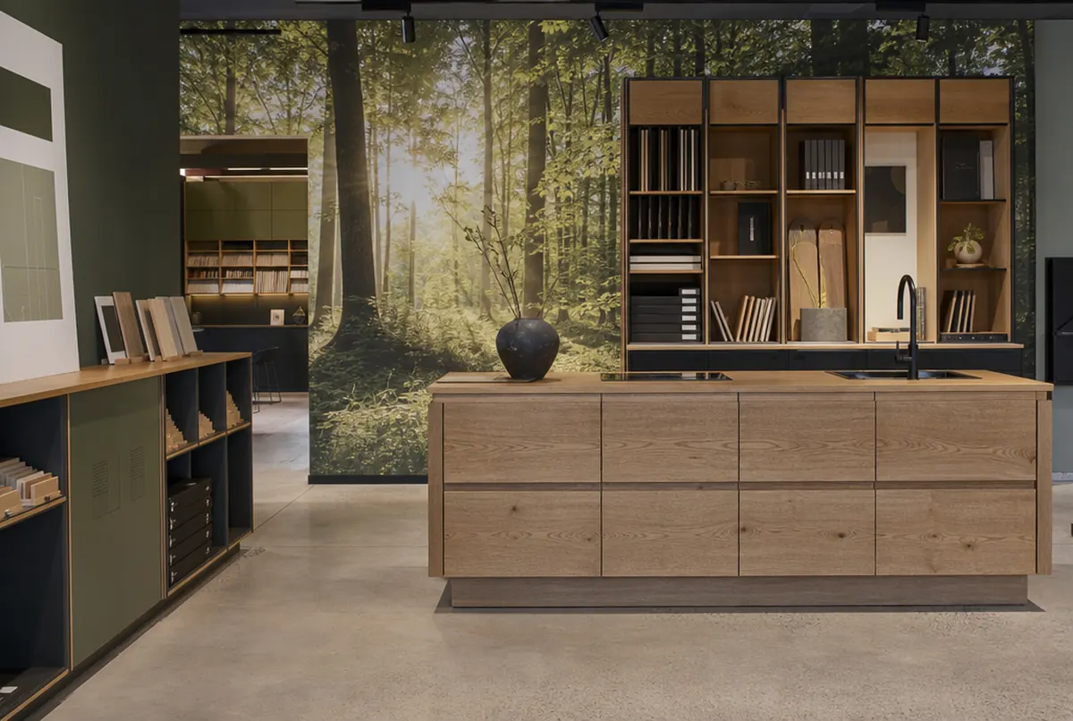 Joinery showroom with a wall mural and labels by the samples