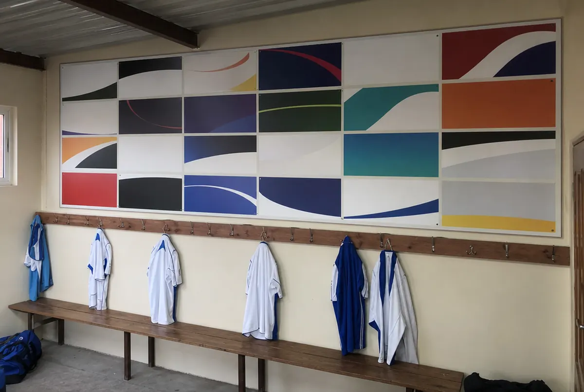 Club wall with a sponsor board in the changing room