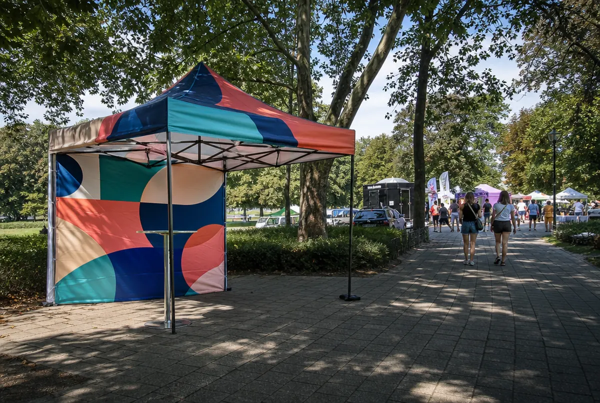 Printed 3 × 3 m branded gazebo at a fete in a park