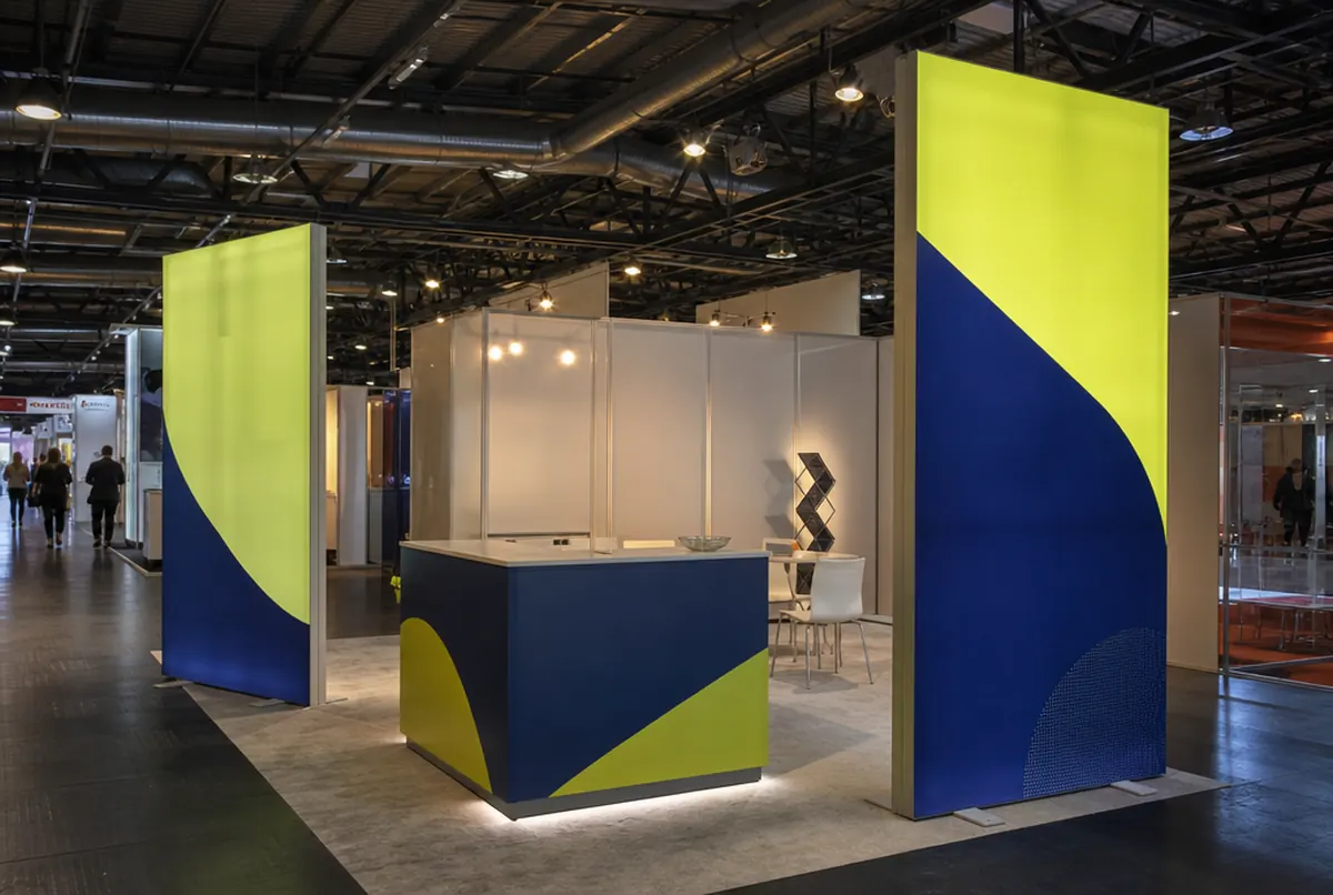 Double-sided backlit textile frames on feet at a trade fair stand