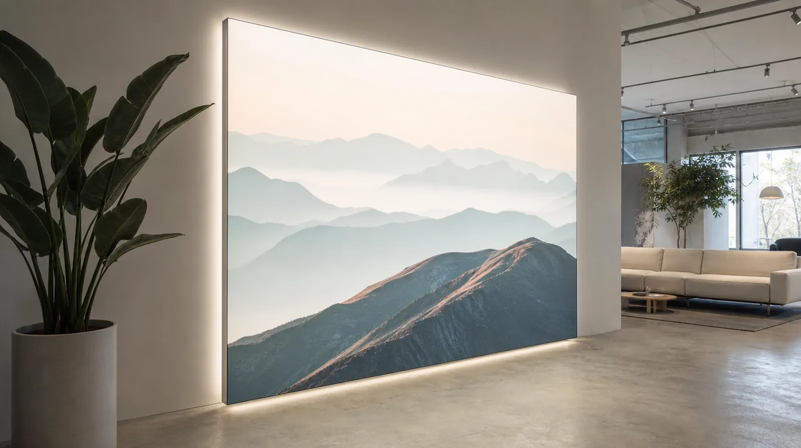 Backlit SEG fabric frame with a landscape print in a showroom
